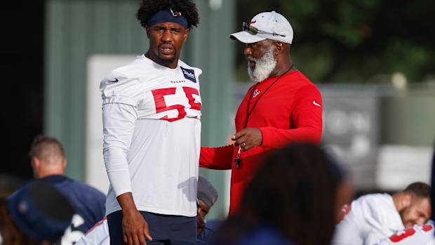 Jerry Hughes, Lovie Smith